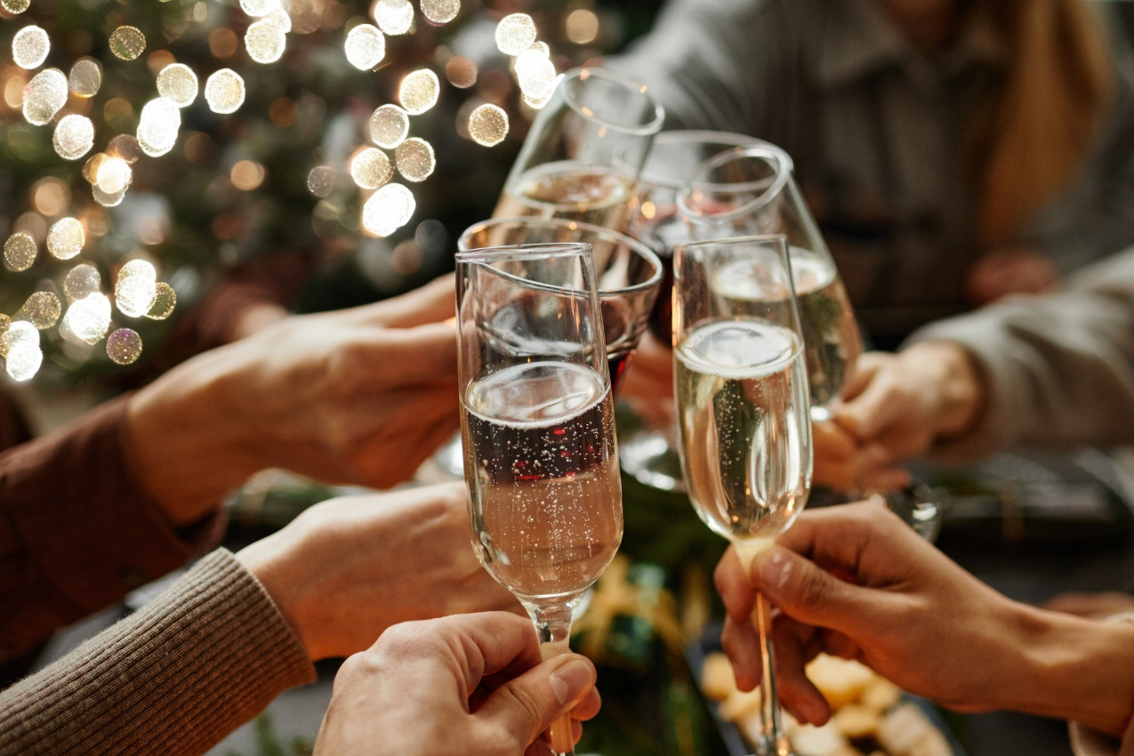 Group of people's hands with champagne glasses